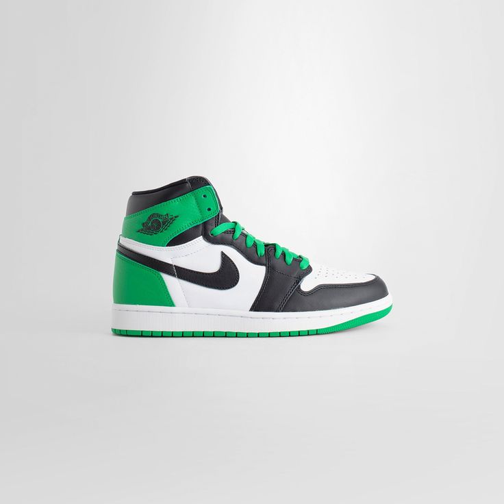 Green, black, and white high-top streetwear sneakers with leather upper and Nike swoosh logo