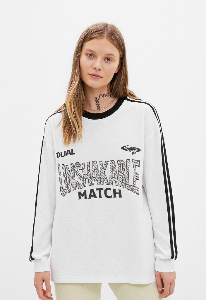 White long-sleeved shirt with black stripes from Unshakable Match Streetwear collection