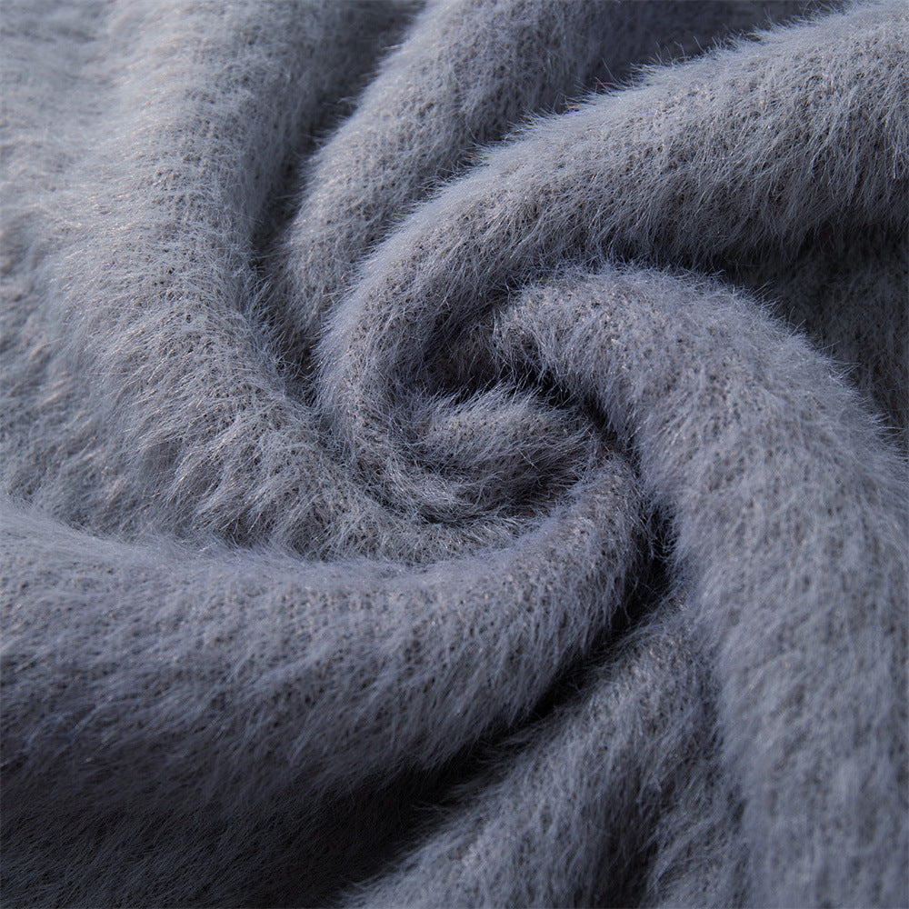 Swirled blue-gray fabric of Fuzzy Graphic Knit Sweater displayed elegantly