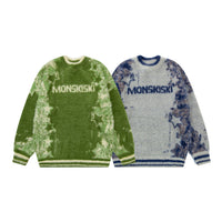 Two fuzzy sweaters from MONSKISKI featuring a green star knit design