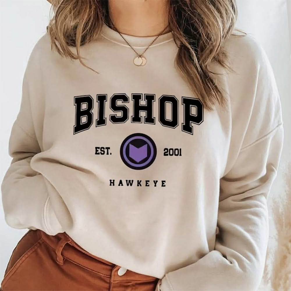 Beige Bishop Hawkeye graphic sweatshirt featuring bold Bishop and Hawkeye text design