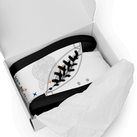 White high-top canvas shoes in box offering durable canvas and ankle support