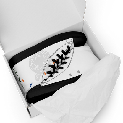 White high-top canvas shoes in box offering durable canvas and ankle support