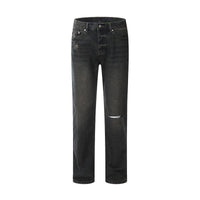 Distressed black denim jeans.