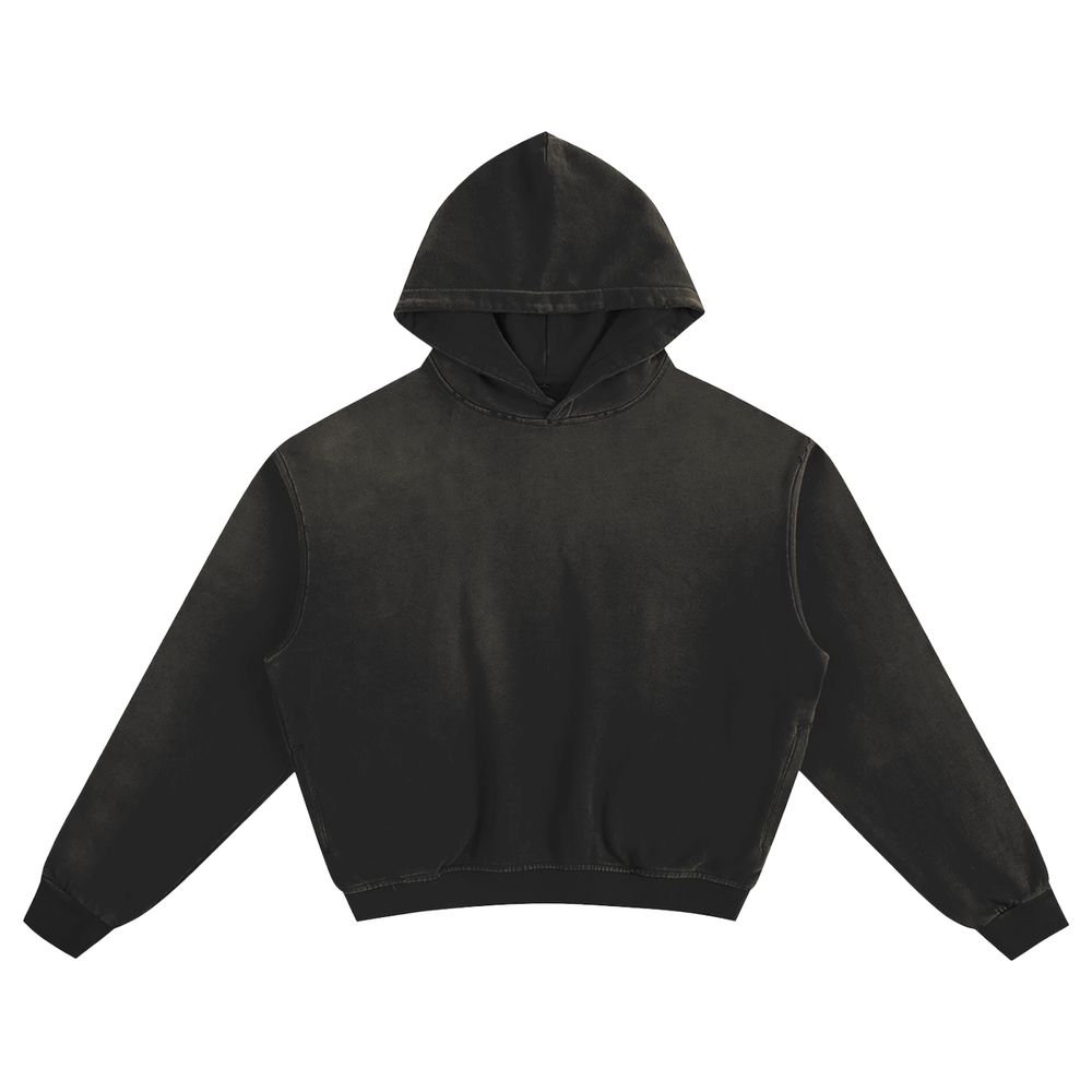 Black essential hoodie with vintage wash finish, featuring a relaxed fit and soft fabric.