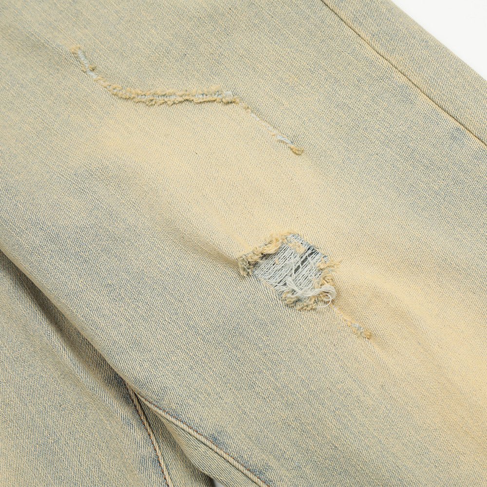 Distressed denim fabric.