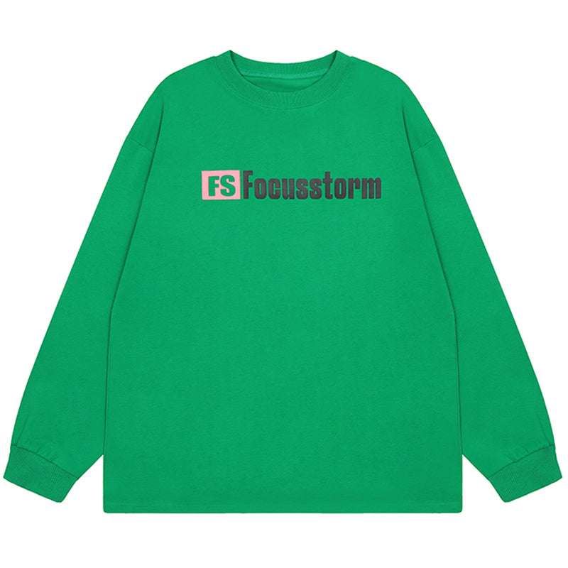 Green long-sleeved Focusstorm sweatshirt featuring stylish oversized streetwear design
