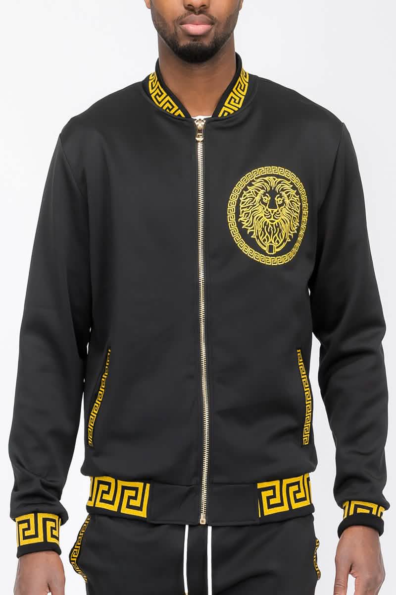 Black and gold lion bomber jacket featuring Greek key design and lion emblem detail