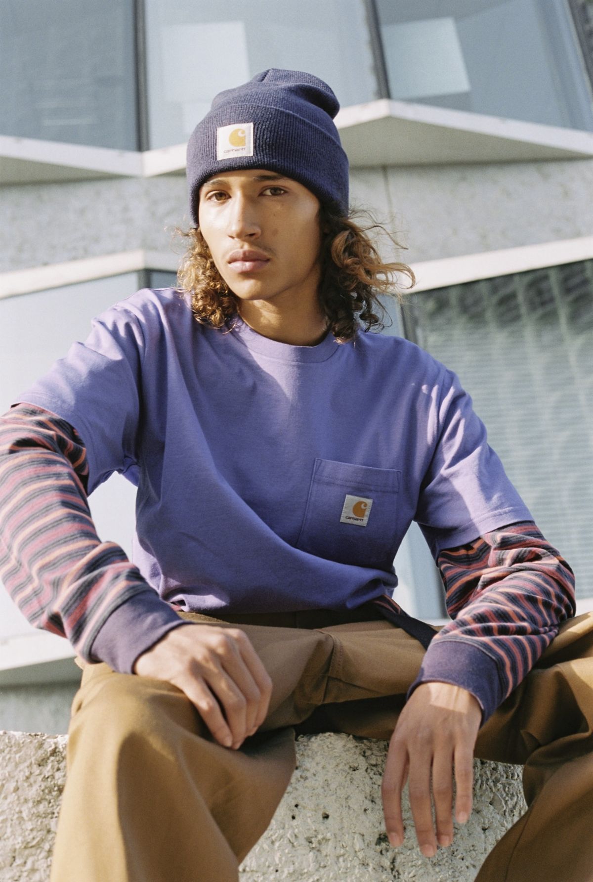 Men showcasing New York streetwear apparel —  in a Carhartt WIP beanie and pocket tee