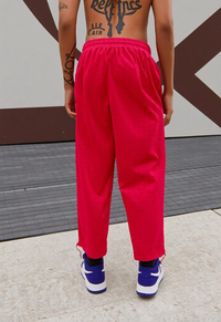 Red Retro Track Pants featuring vibrant red color and comfortable athletic style