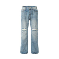 Ripped, light-wash denim jeans.