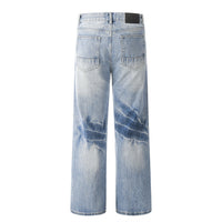 Light blue distressed denim jeans.