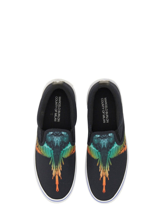 Vulkaniserade slip-ons med fågeltryck